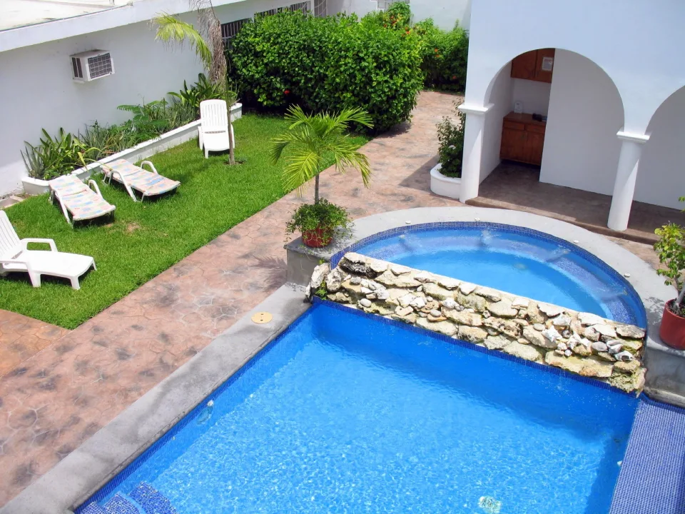 Second Floor Porch View of IslaMar Pool & Garden — In Town Villas, Cozumel