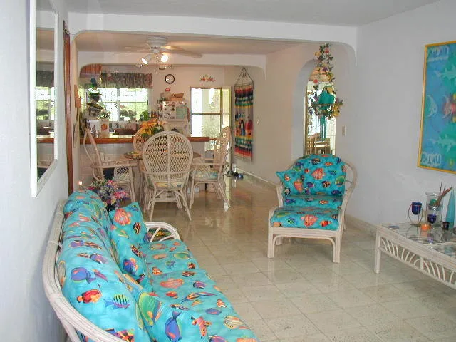 Living Area with View of Dining, Kitchen & Private Backyard — IslaMar Villa #5N, In Town Villas, Cozumel